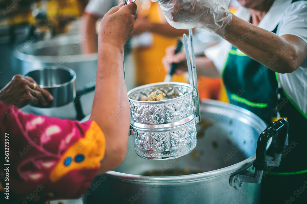 Obraz premium Donate Meals for Poor Persons in Thailand