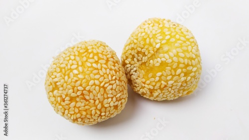 Indonesian tradisional food onde onde or sesame ball with mung bean filling isolated on white background