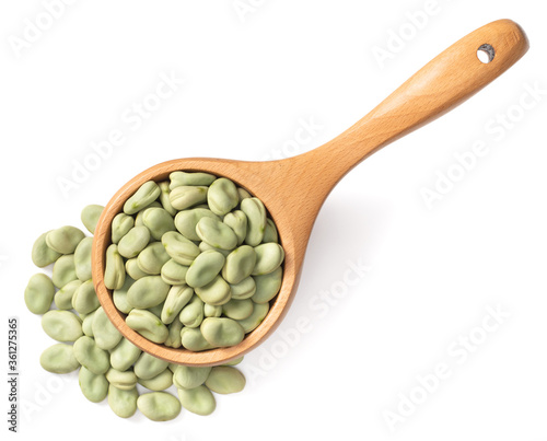 Fotografija dried green broad beans in the wooden spoon, isolated on white background, top v