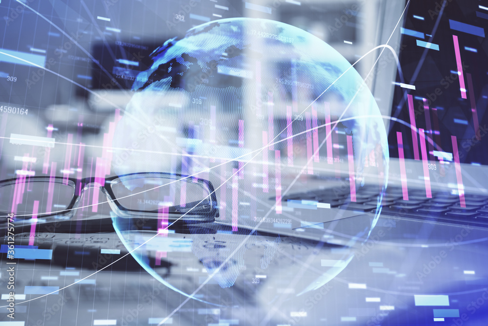 Financial chart hologram with glasses on the table background. Concept of business. Double exposure.