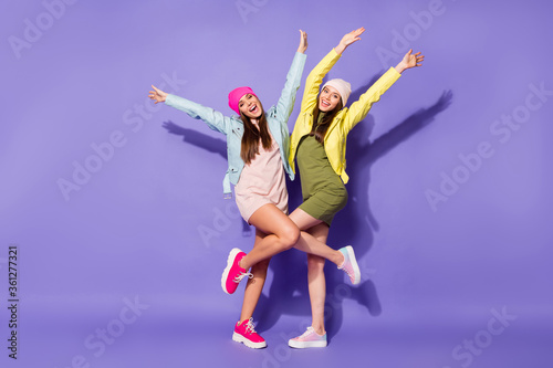 Fototapeta Naklejka Na Ścianę i Meble -  Full length body size view of nice attractive pretty cheerful girls dancing having fun bachelorette social life lifestyle isolated on bright vivid shine vibrant violet lilac purple color background
