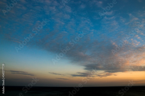 sunset and clouds over the sea © Cihat