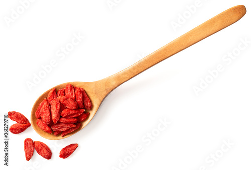 Tableau sur toile dried Chinese wolfberries in the wooden spoon, isolated on white background, top