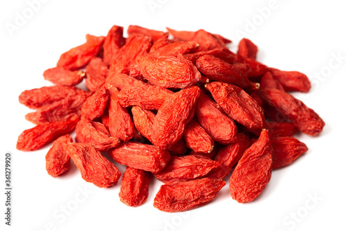 a pile of dried Chinese wolfberries isolated on white background