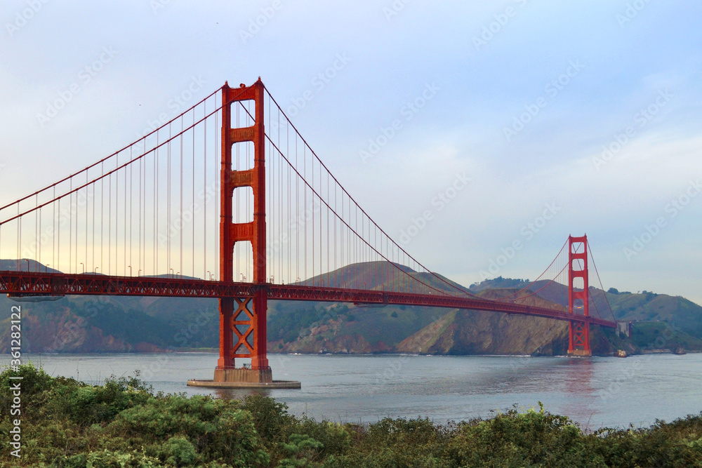 San Francisco 2013, The smooth curve of the Golden gate Bridge in the bay with nice dusk colors San Francisco 2013, The smooth curve of the Golden gate Bridge in the bay with nice dusk colors