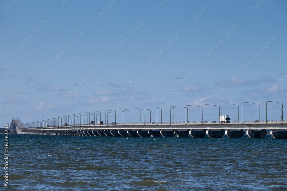 The Oland Bridge is a road bridge connecting Kalmar on mainland Sweden to Färjestaden on the island of Öland to its east with the characteristic hump at its western end