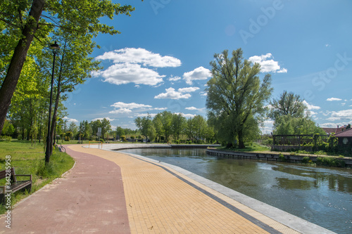 Fototapeta Naklejka Na Ścianę i Meble -  Pisa river and walking and cycling path in Pisz.