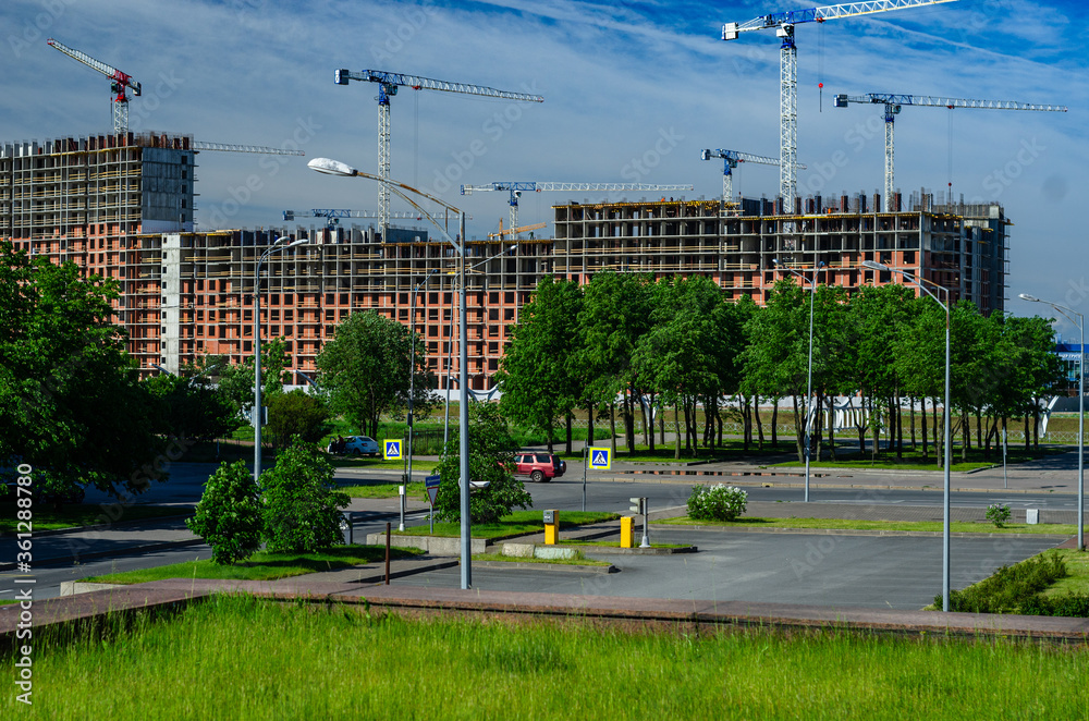 Obraz premium Monolithic construction. Metal-concrete frame of the building. Front works. Construction of modern housing. Residential cosplex Captain's Harbor, St. Petersburg, Russia, 06.24.2020