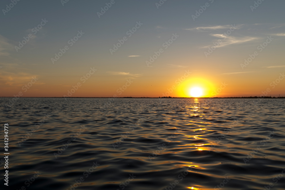 Breathtaking sunset in Danube Delta,  Romania,  in a summer day; outdoors