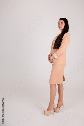 business woman on grey background with copy space. Director in suit © fasli