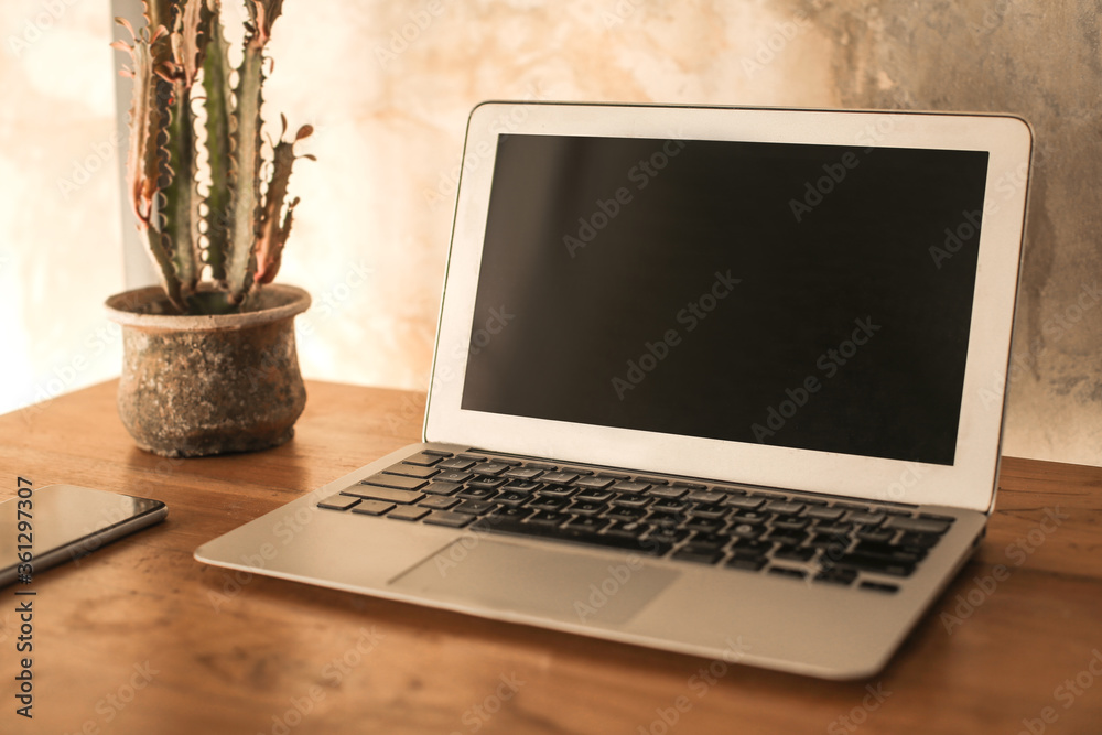 Fototapeta premium Laptop on a modern office desk