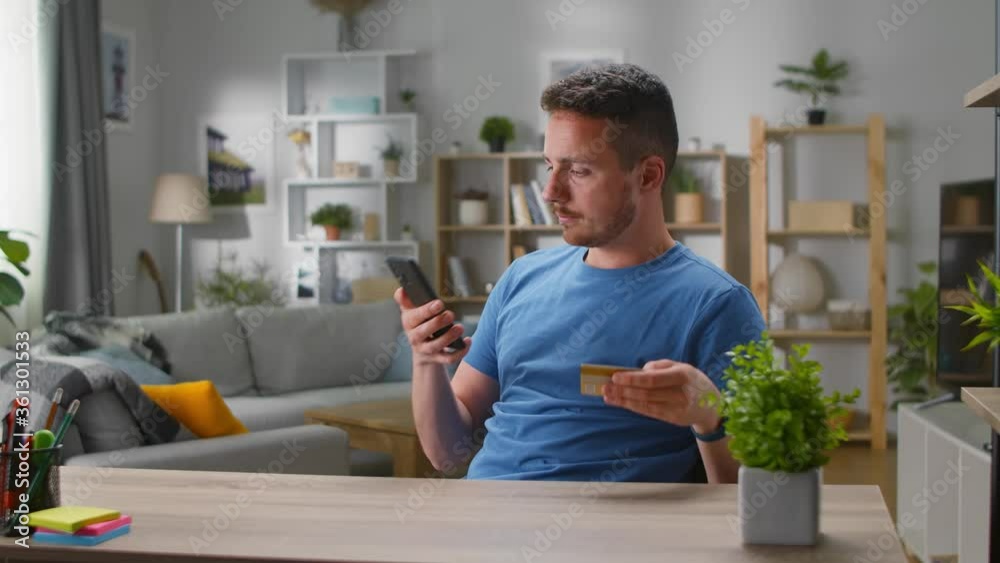 A young handsome man makes an online order and the package teleports to him from above in a second