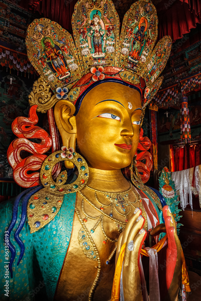 Maitreya Buddha statue close up in Thiksey Gompa. Ladakh, India Maitreya Buddha statue close up in Thiksey Gompa. Ladakh, India