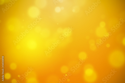 Bokeh abstract orange and yellow beautiful background. Soft color light glitter sparkles. use for backdrop or design cosmetic advertising, beauty, summer, christmas, banner, product display