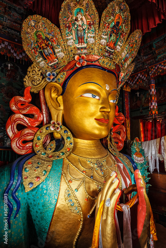 Maitreya Buddha statue close up in Thiksey Gompa. Ladakh, India
