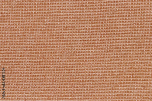 Natural fabric brown beige sackcloth or burlap texture background for design with copy space. Woven hessian sackcloth burlap texture background.