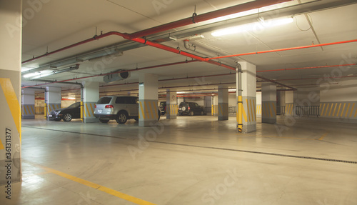 Cars on underground parking garage.