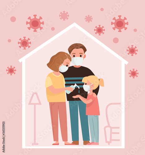 Coronavirus 2019-nCoV. Family members protect themselves from corona, disinfect with hand sanitizer, wear a medical mask. Family staying at home during Coronavirus pandemic.
