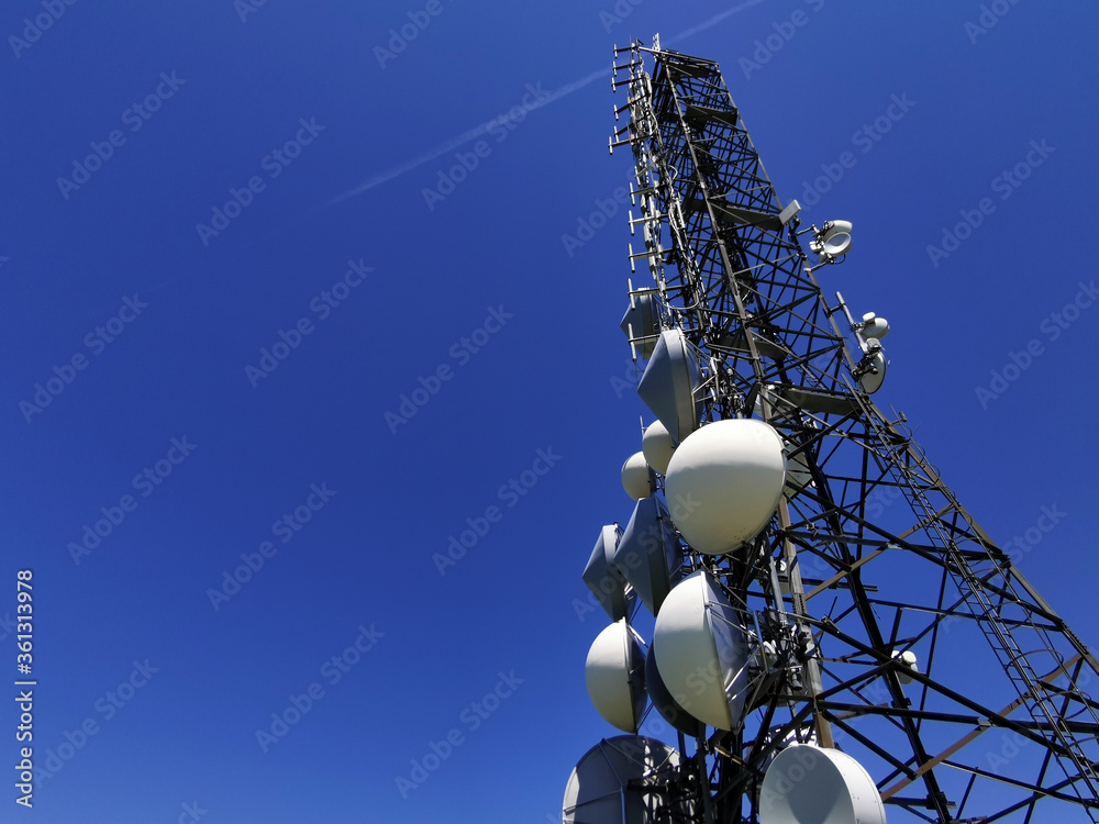 telecom cellular Communication Antenna tower on blue background - obrazy, fototapety, plakaty 