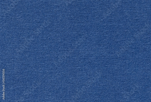 Close up view of textured blue creative paper background. Extra large highly detailed image.