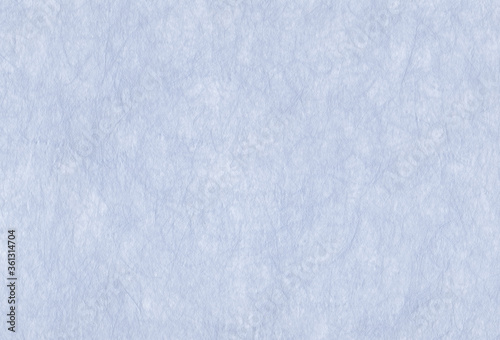 Sheet of hand crafted light blue rough paper background with inclusions of natural fibers. Extra large highly detailed image.