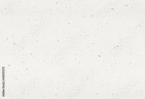 Sheet of recycled paper background with inclusions of golden particles. Extra large highly detailed image.