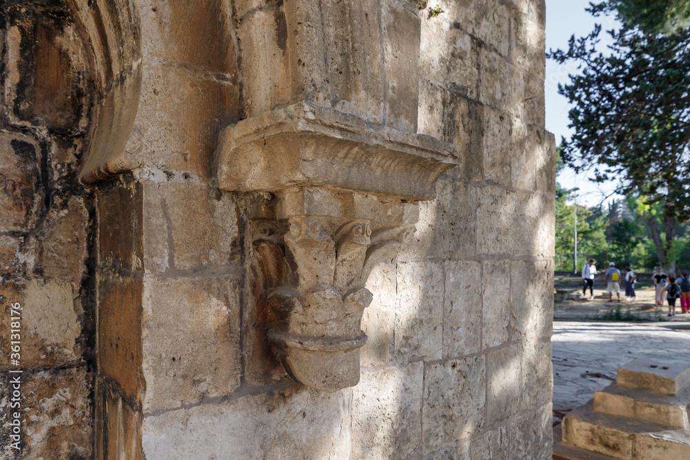 Stone carving decoration on the wall of the abandoned crypt in the Arab cemetery in the quarter of Mamila in Jerusalem, Israel Stone carving decoration on the wall of the abandoned crypt in the Arab cemetery in the quarter of Mamila in Jerusalem, Israel