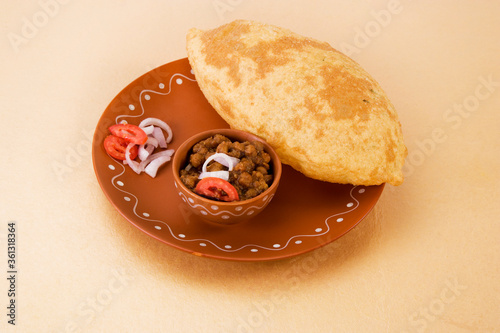 Photography Channa Masala with Puri or Kabuli Chana with bhutara or spicy Chole, Indian Food