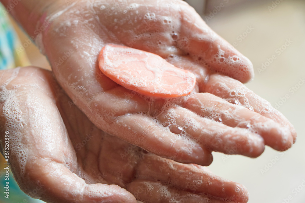 child washing hands with soap during covid pandemic child washing hands with soap during covid pandemic