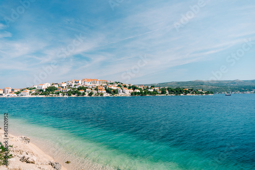 The city of Rogoznica in Croatia. Villas, hotels and houses on the Adriatic coast, azure blue water and sandy beaches.