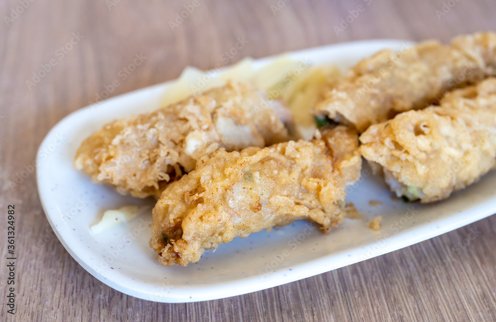 Fried shrimp roll - Taiwanese food cuisine in Tainan, Taiwan restaurant, close up, lifestyle. Fried shrimp roll - Taiwanese food cuisine in Tainan, Taiwan restaurant, close up, lifestyle.
