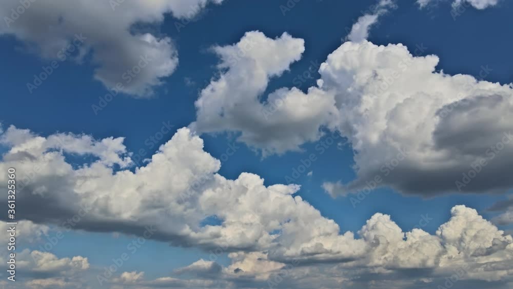 Motions clouds puffy fluffy white clouds sky time lapse slow moving clloudscape timelapse cloudy. Motions clouds puffy fluffy white clouds sky time lapse slow moving clloudscape timelapse cloudy.
