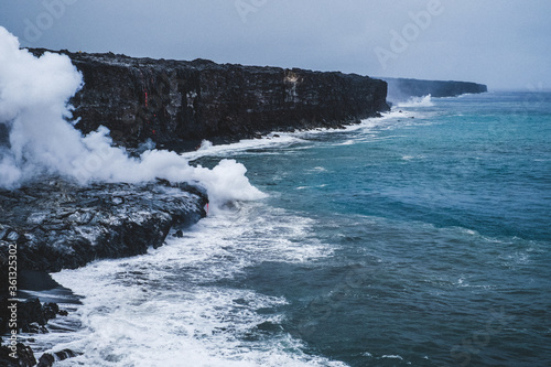 Lava flowing in to ocean Hawaii