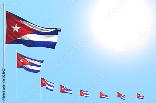 nice many Cuba flags placed diagonal on blue sky with space for your text - any holiday flag 3d illustration..
