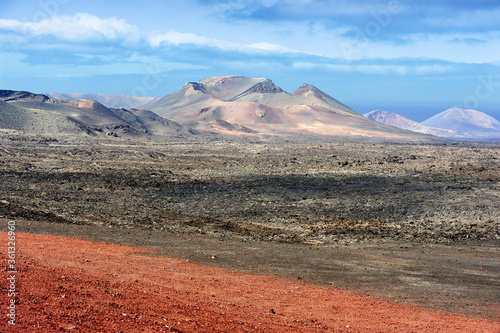 wild volcanic landscape at Timanfaya National Park  Lanzarote Island  Canary Islands  Spain