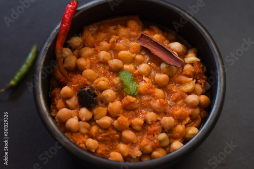 Chana masala, also known as channay, chole masala, chole or chholay, is a dish originating from the Indian subcontinent photo