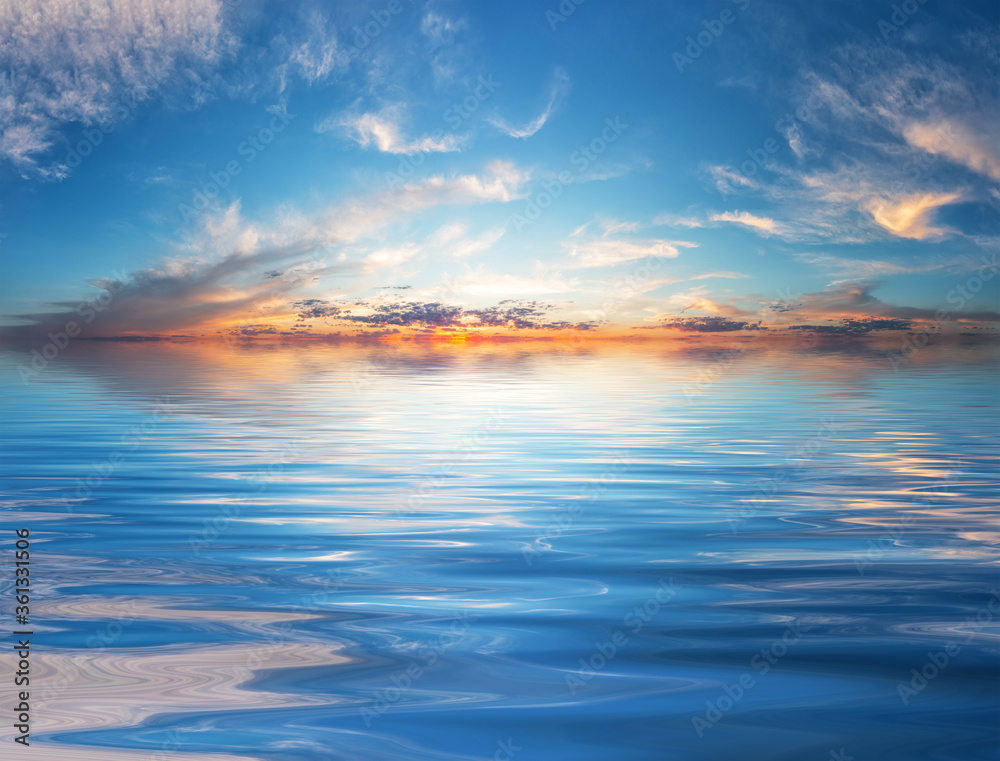 Fototapeta premium Sunset sky over water surface