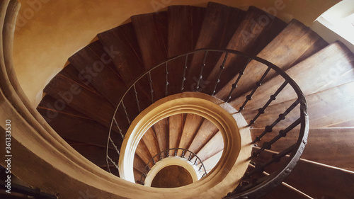 The stairs lead down in a circle.