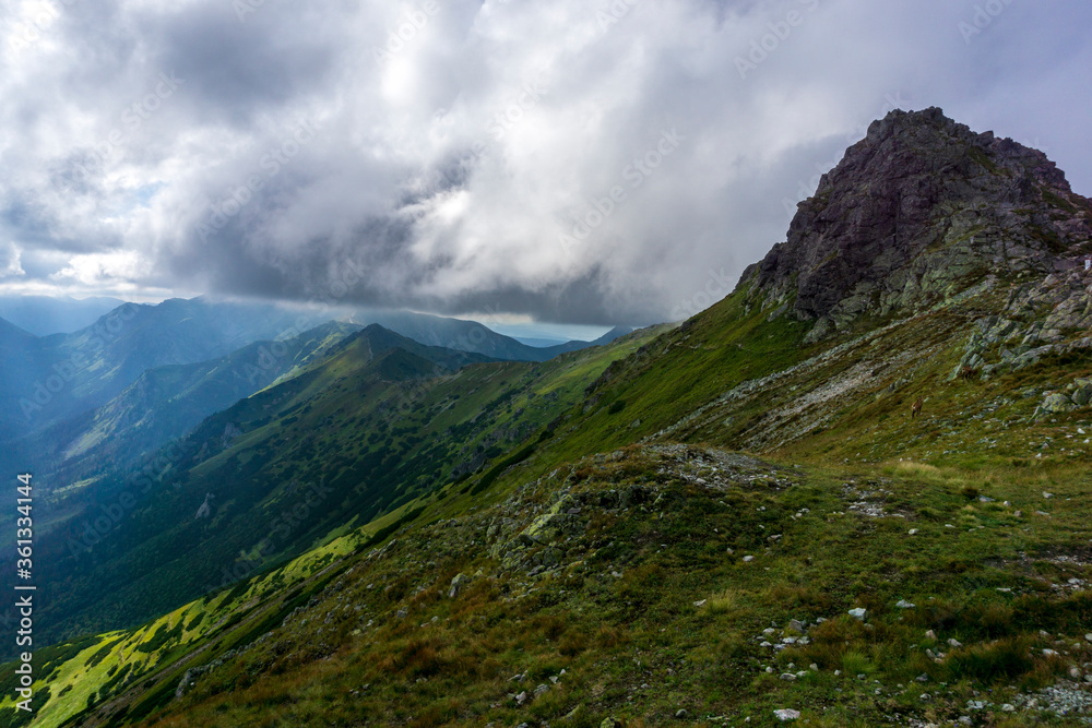 Big clouds on a mountain range. Tatra Mountains. Big clouds on a mountain range. Tatra Mountains.