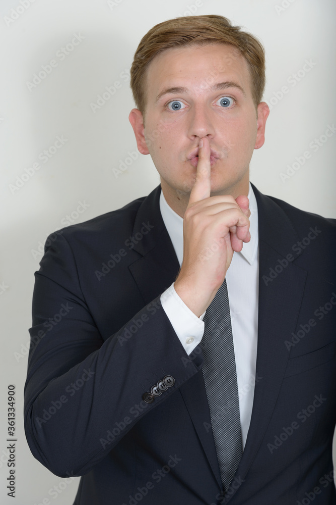 Portrait of businessman with blond hair wearing suit Portrait of businessman with blond hair wearing suit