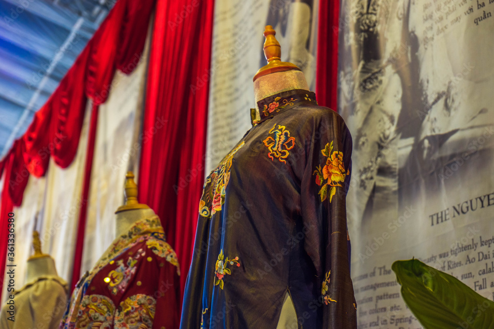 Obraz premium displaying Ao dai and Vietnamese traditional costumes during street festivals in Nguyen Hue street, Ho Chi Minh city, Vietnam