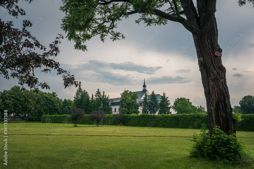 Park near Church in Gora Kalwaria, Masovia, Poland.
