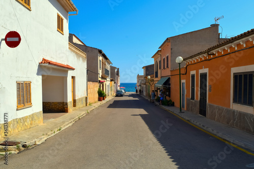 Light street, leading to the coast of the sea with blue bright sky © Наталья К.