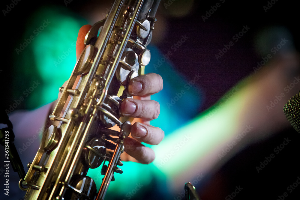 Fototapeta premium Men's hand holging brass music instrument