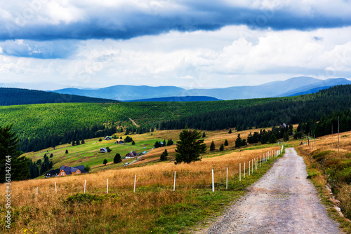 View of hiking trails and Karkonosze (Krkonose) mountains national park at the Poland and Czech Republic border.Scenic summer landscape with beautiful views. Spindlerov Mlyn is a popular tourist place photo