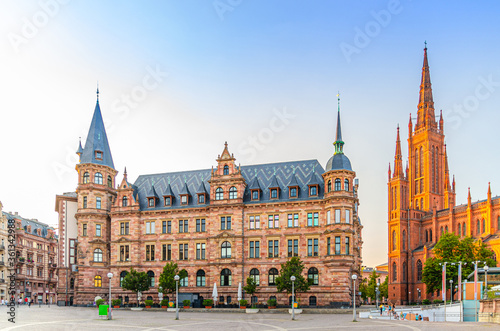 Wiesbaden cityscape with City Palace Stadtschloss or New Town Hall Rathaus and Evangelical Market Protestant church or Marktkirche on Market Square in historical city centre, State of Hesse, Germany