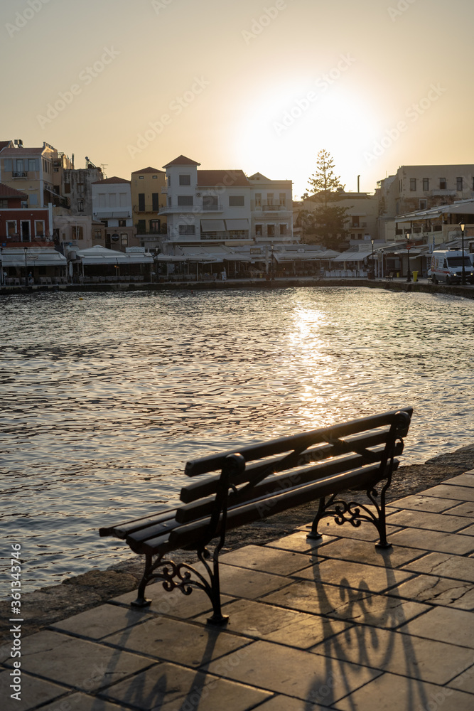 Bench against the sunrise in Chania, Crete Bench against the sunrise in Chania, Crete