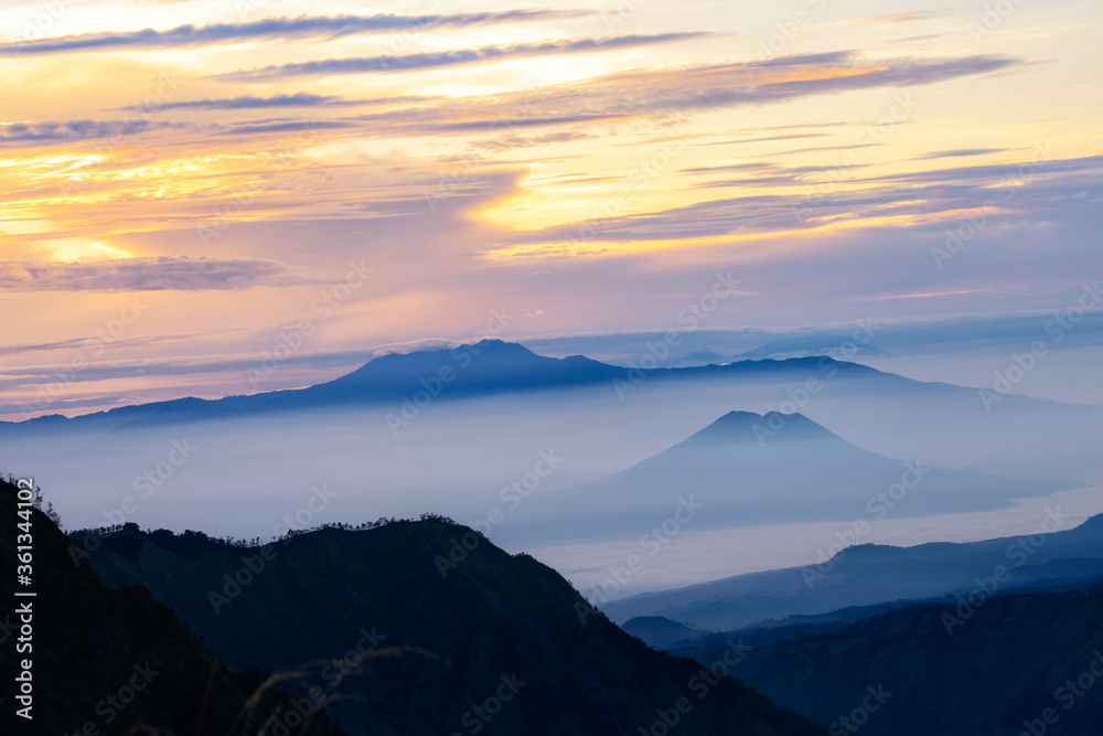 Bromo Mountain and fog around bromo mountain, in East Java, Indonesia. Indonesian call Gunung Bromo.