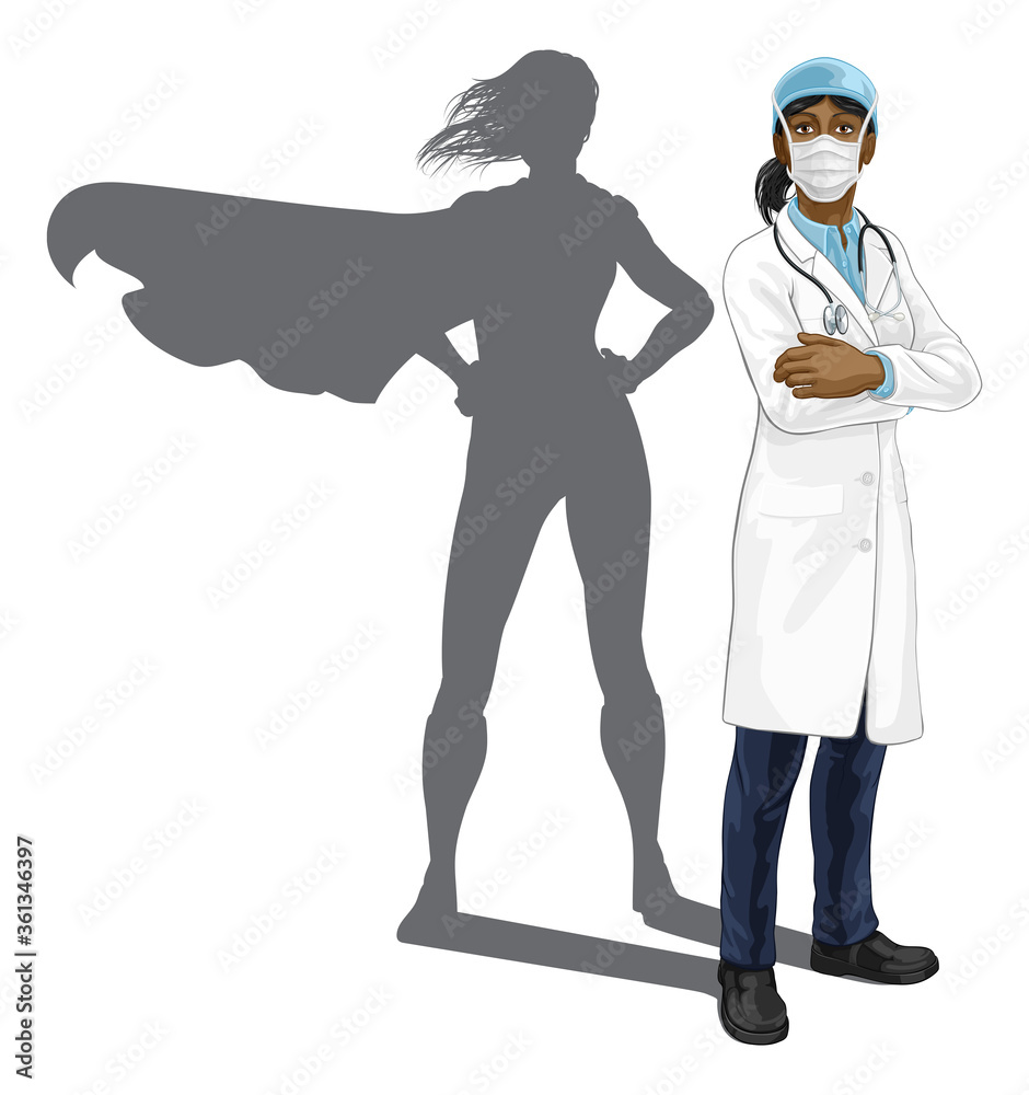 Fototapeta premium A female doctor super hero woman with stethoscope and mask PPE. With arms folded and serious but caring look. Revealed as a superhero by the shape of her shadow.