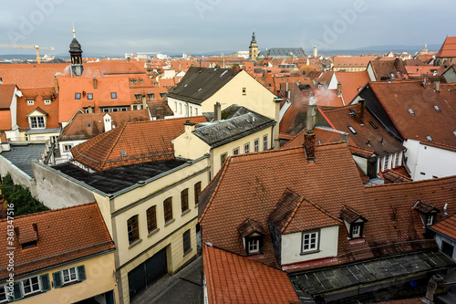Wallpaper Mural View of traditional houses with typical red tiled rooftops in Bamberg, Bavaria, Franconia, Germany. November 2014 Torontodigital.ca